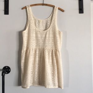 Vintage cream-colored sleeveless top. Fits M/L.